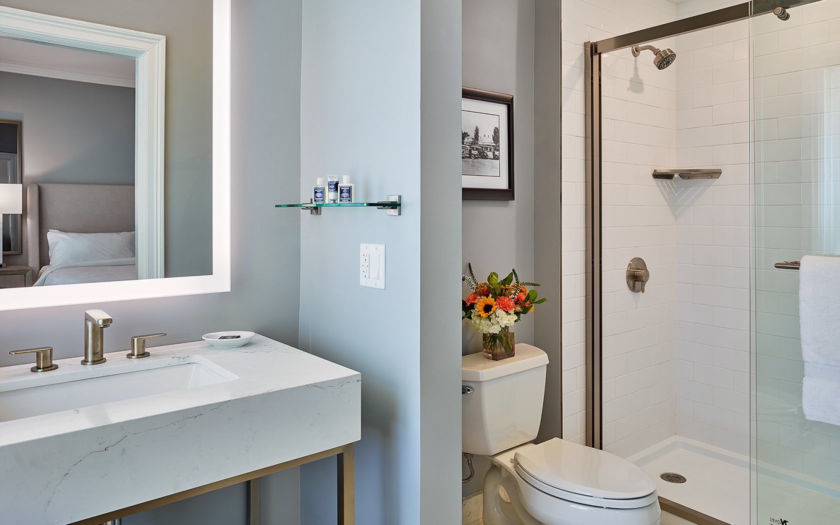 A new bathroom with cool blues and glass doors