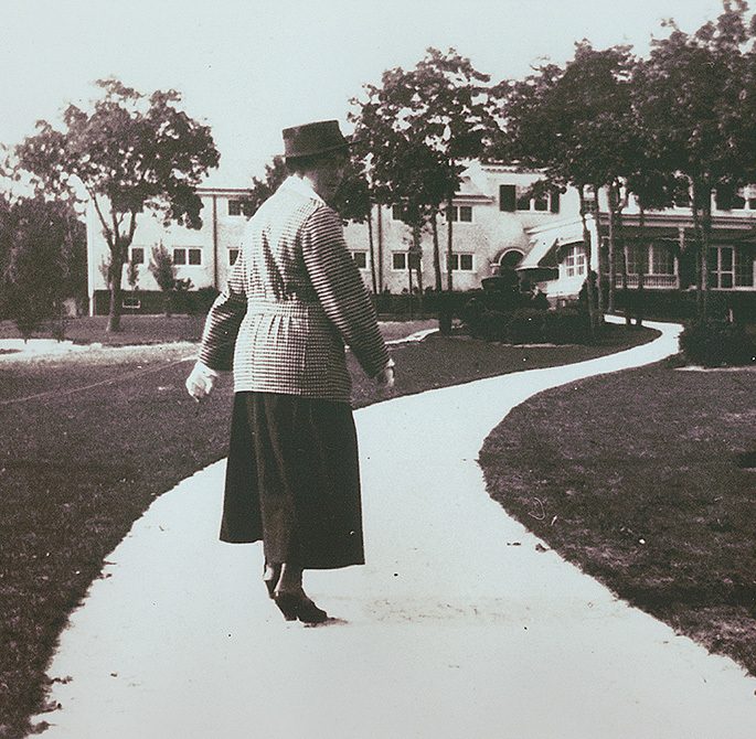 Hotel Guest walking up the driveway of historic Seaview