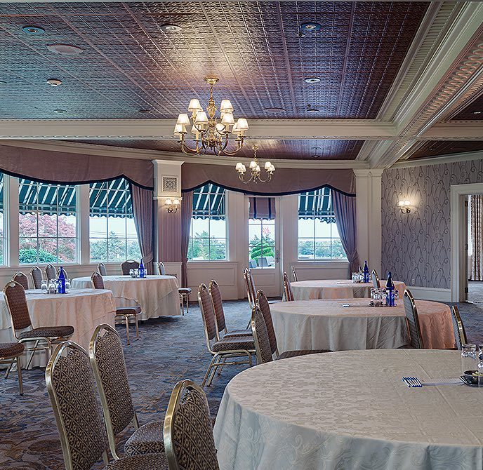 Tables and chairs in event space